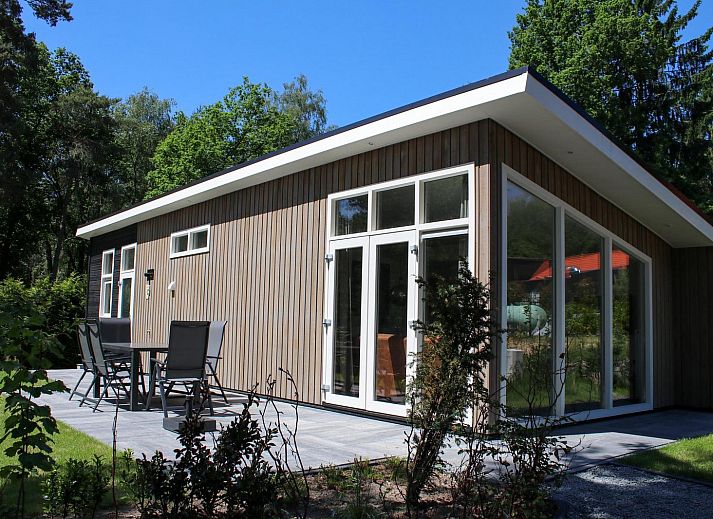 Vacation home Heidehoeve comfort in Hoenderloo with beautiful terrace surrounded by nature on the Veluwe, Gelderland.