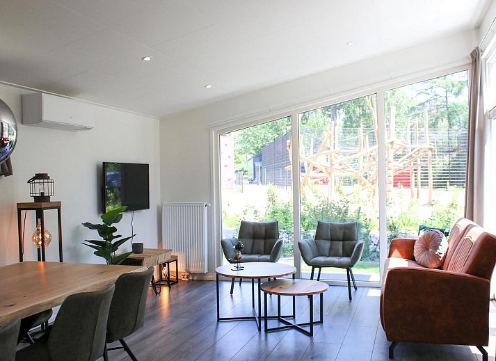 Vacation home Heidehoeve comfort in Hoenderloo with beautiful terrace surrounded by nature on the Veluwe, Gelderland.