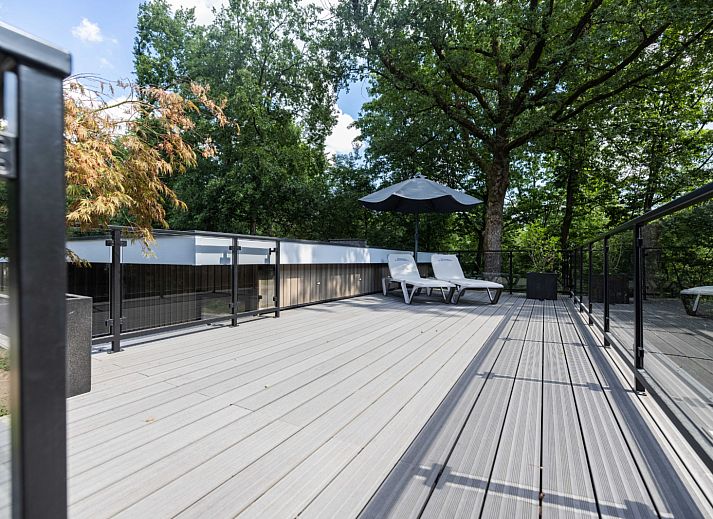 Gezellige zithoek in Vakantiewoning Boszicht Luxe, vakantiehuis in Hoenderloo, Veluwe.