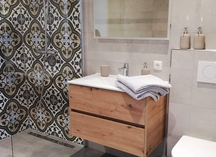 Ferienhaus in Hoenderloo in der Veluwe mit grossem Aussenbereich und gruener Umgebung in Gelderland.