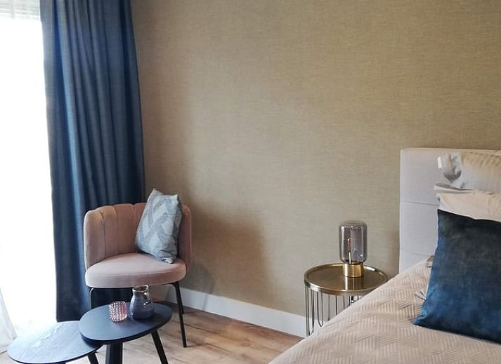 Ferienhaus in Hoenderloo in der Veluwe mit grossem Aussenbereich und gruener Umgebung in Gelderland.