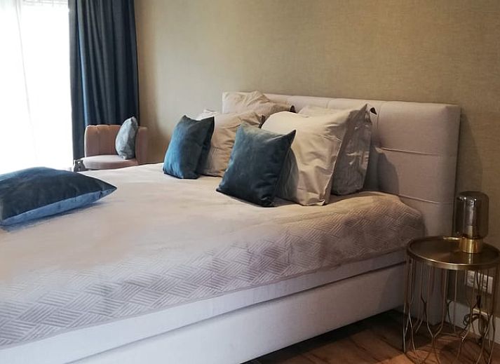 Gemuetliches Aeusseres des Ferienhauses in Hoenderloo, Veluwe, mit moderner Architektur in Gelderland.