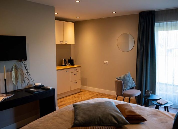 Gemuetliches Aeusseres des Ferienhauses in Hoenderloo, Veluwe, mit moderner Architektur in Gelderland.