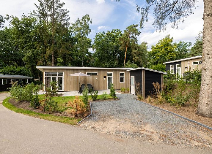 Detached house in Hoenderloo in the Veluwe, Gelderland, with modern exterior and green surroundings.