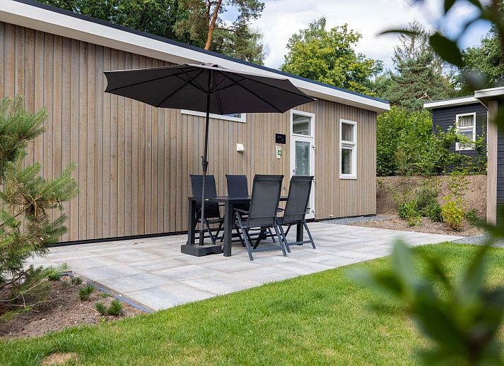 Detached house in Hoenderloo in the Veluwe, Gelderland, with modern exterior and green surroundings.