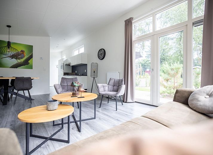 Terrace of detached house in Hoenderloo, Veluwe, with comfortable seating.