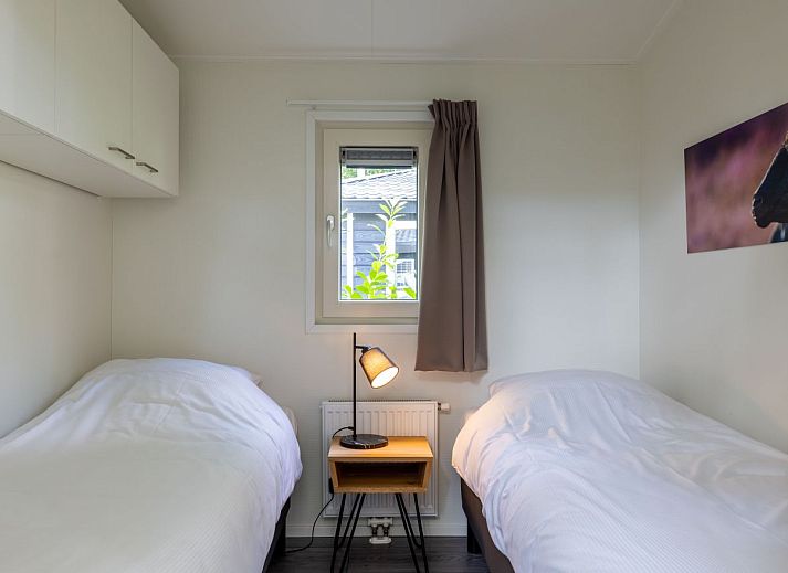 Terrace of detached house in Hoenderloo, Veluwe, with comfortable seating.