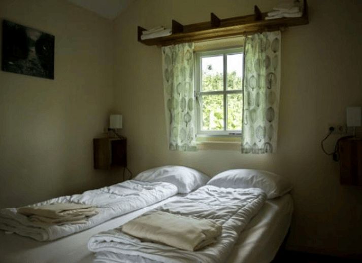 Cottage in Terwolde, cottage with terrace in Veluwe, Gelderland, surrounded by greenery and tranquility.