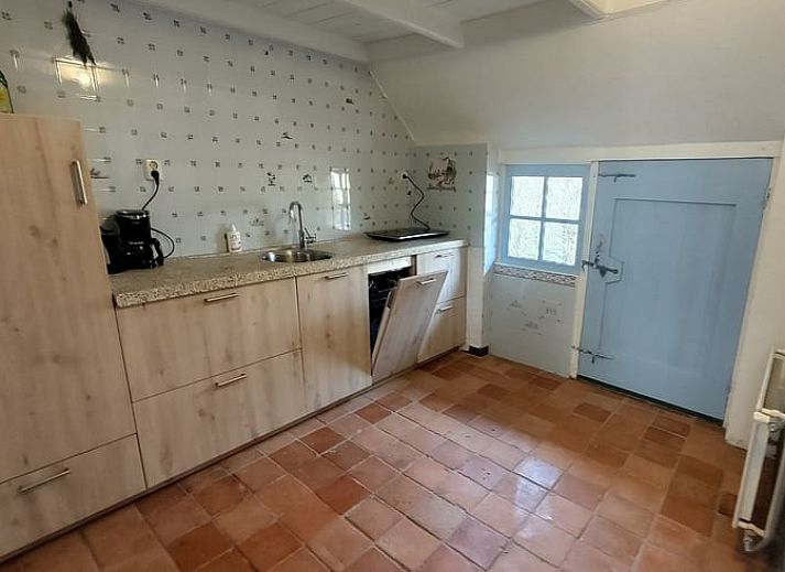 Gezellig terras bij Huisje in Terwolde, vakantiehuis op de Veluwe, ideaal voor ontspanning in de buitenlucht in Gelderland.