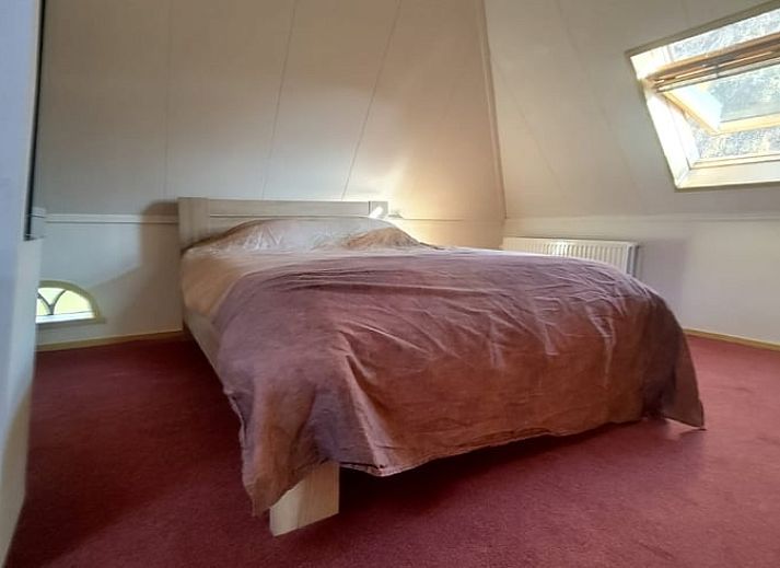 Huisje in Terwolde, vakantiehuis op de Veluwe, met uitnodigend terras en rustieke uitstraling in Gelderland.