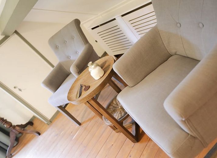 Ferienhaus in Garderen, Ferienunterkunft in der Veluwe, Gelderland, mit schoener Terrasse und umliegender Natur.