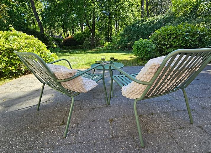 Gezellige tuin bij Huisje in Garderen, vakantieverblijf op de Veluwe, Gelderland.