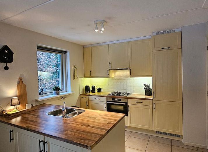 Winterse charme van Huisje in Garderen, vakantiehuis op de Veluwe, Gelderland.