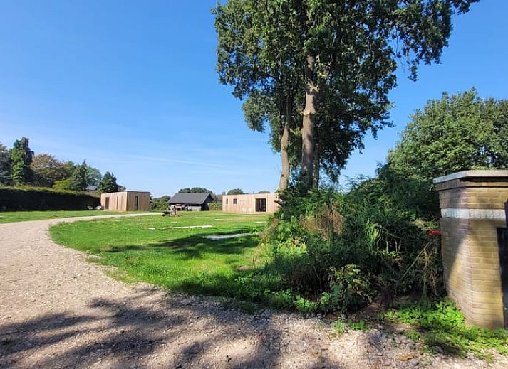 Cozy entrance to cottage in Elspeet with wooden details, Veluwe, Gelderland.