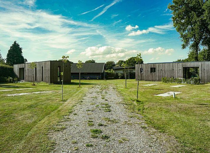 Cozy entrance to cottage in Elspeet with wooden details, Veluwe, Gelderland.