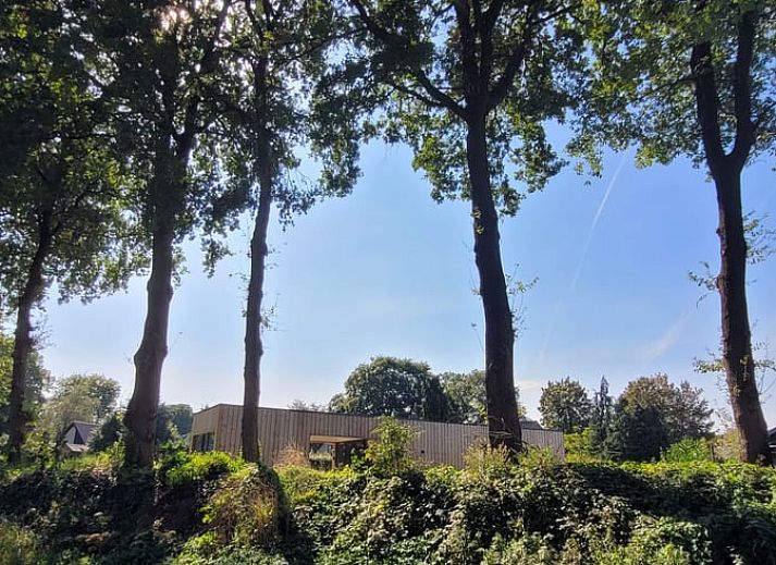 Stylish living room in Holiday home in Elspeet with modern kitchen, Veluwe, Gelderland.