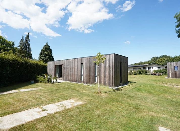Stylish living room in Holiday home in Elspeet with modern kitchen, Veluwe, Gelderland.