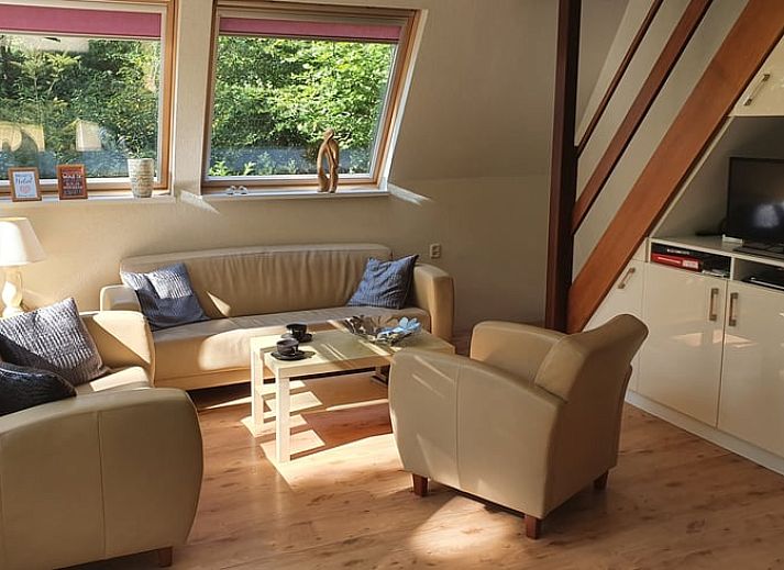 Huisje in Elspeet, vakantiehuis in de Veluwe, Gelderland, omringd door weelderig groen en natuur.