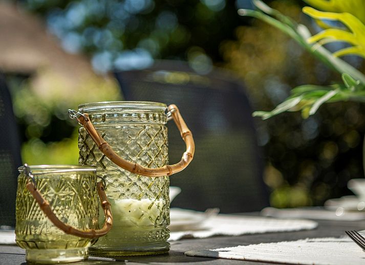 Geniet van de buitenlucht op het terras van Vakantiewoning Sprielderbosch 14 't Sprielderhof in Putten, Veluwe.