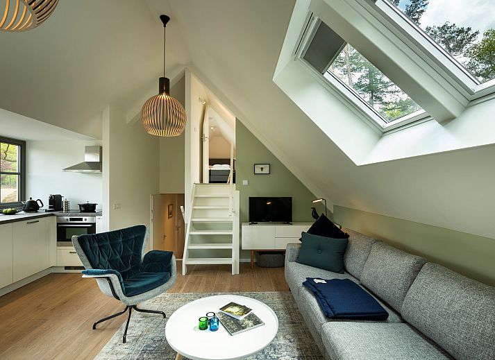 Ontdek de charmante buitenruimte van vakantiehuis Sprielderbosch 45 'Skogen' op de Veluwe in Gelderland.