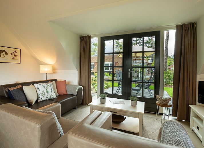 Charming vacation home Holiday home Sprielderbosch 12 'De Kuifmees' in Putten, Veluwe, surrounded by green nature.