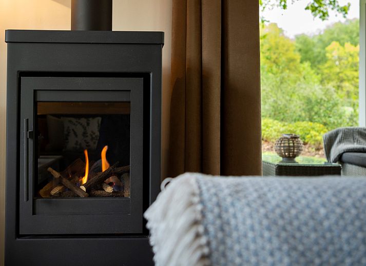 Cozy terrace at Holiday home Sprielderbosch 12 'De Kuifmees', vacation home in Putten, Veluwe, ideal for relaxation.