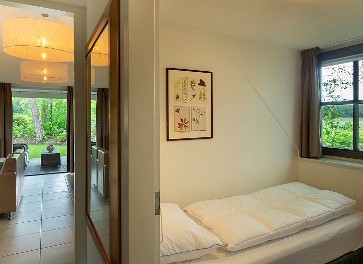 Modern kitchen and living room in Holiday home Sprielderbosch 12 'De Kuifmees', vacation home on the Veluwe in Putten.