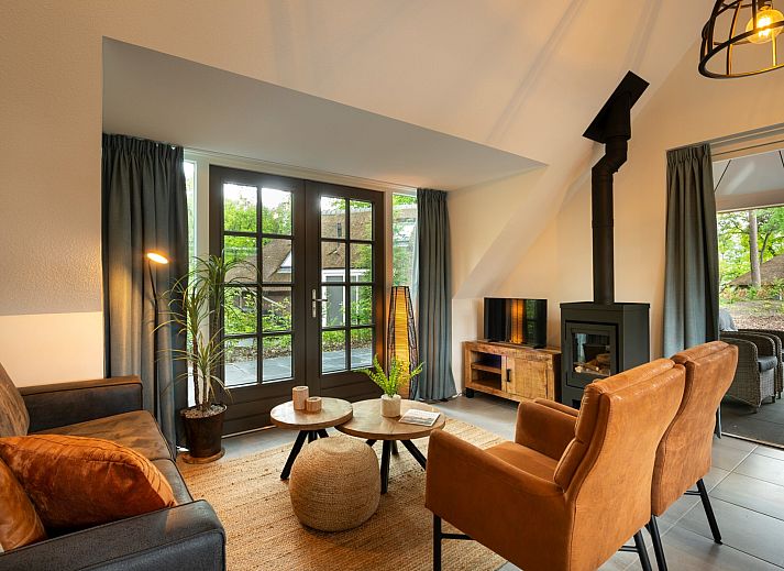 Vakantiewoning Sprielderbosch 29 'Casa Esther' in Putten, Veluwe, omgeven door groene natuur en prachtige flora.