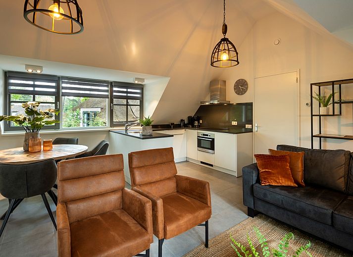 Vakantiewoning Sprielderbosch 29 'Casa Esther' in Putten, Veluwe, omgeven door groene natuur en prachtige flora.