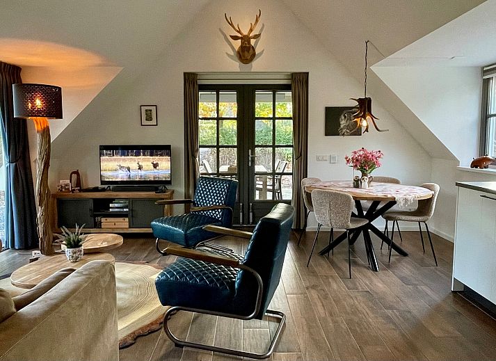 Veranda des Ferienhauses Sprielderbosch 46 De Zonnehoed, ideal fuer ein Essen im Freien in Putten, Veluwe.