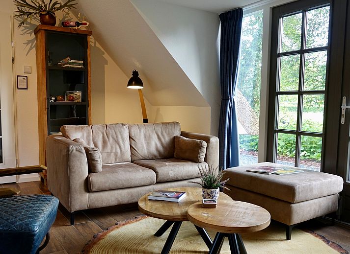 Veranda des Ferienhauses Sprielderbosch 46 De Zonnehoed, ideal fuer ein Essen im Freien in Putten, Veluwe.