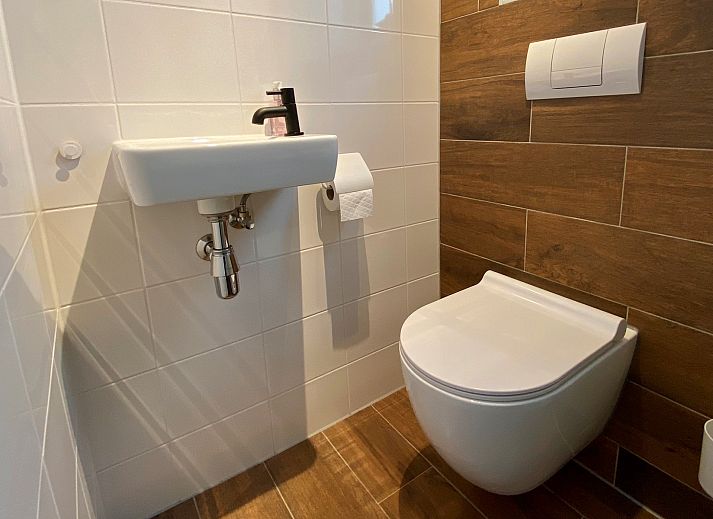 Blumiger Garten des Ferienhauses Sprielderbosch 46 De Zonnehoed in Putten, Veluwe.