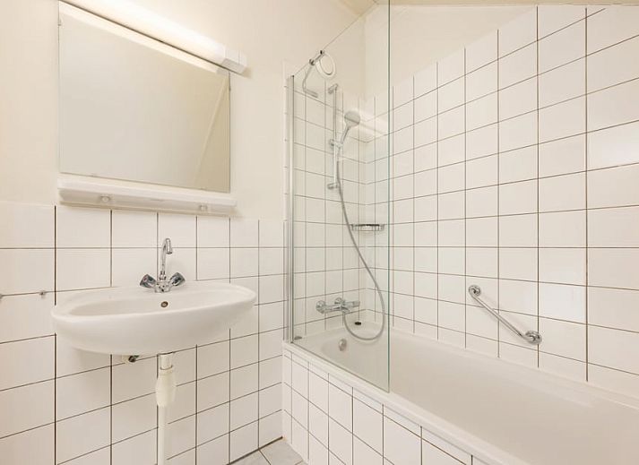 Cozy living room of Veluwse Hoevewoning 4 in Putten, Veluwe. Comfortable vacation home overlooking the green surroundings of Gelderland.