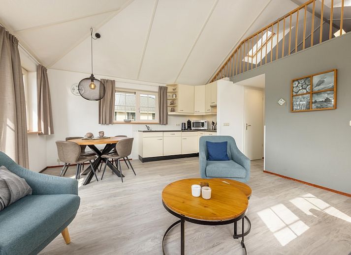 Bungalow 2 in Putten, Veluwe, Gelderland with sunny terrace and green surroundings, ideal vacation home for nature lovers.