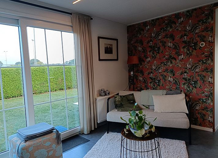 Attractive bedroom in DG1546 vacation home Putten Veluwe with natural light and comfortable furnishings.