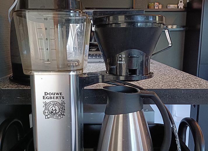 Attractive bedroom in DG1546 vacation home Putten Veluwe with natural light and comfortable furnishings.