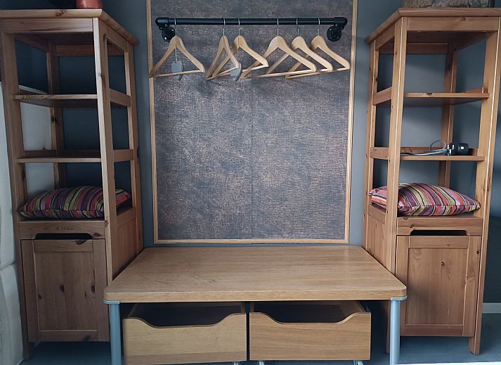 Cozy living room of DG1546 in Putten Veluwe with garden views and stylish decor.