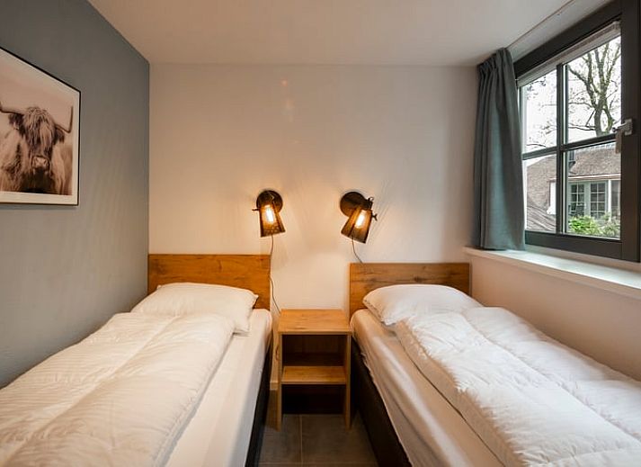 Geraeumige Terrasse am Ferienhaus in Putten, Veluwe, ideal fuer Entspannung in Gelderland.