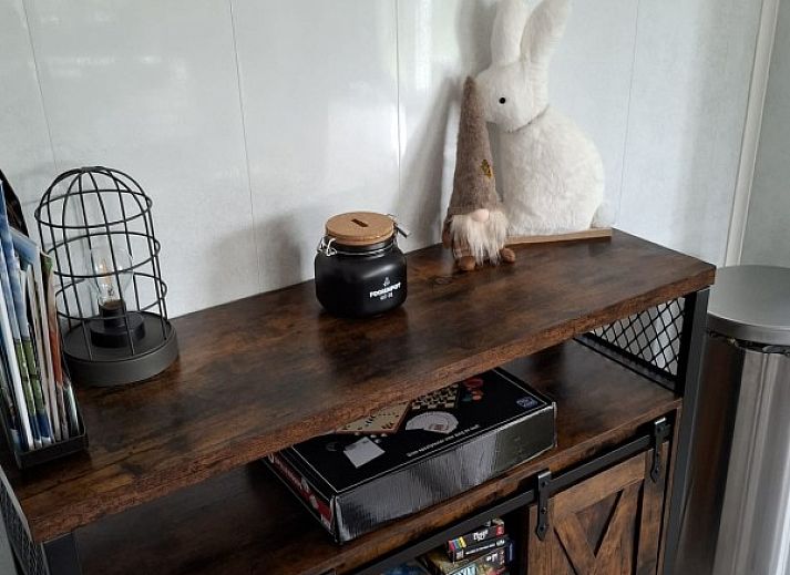 Veranda of Chalet Relax in Putten, Veluwe, Gelderland, surrounded by green nature, ideal for a relaxing vacation stay.