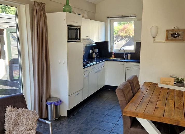 Cozy table set on terrace of vacation home in Putten, Veluwe, Gelderland.