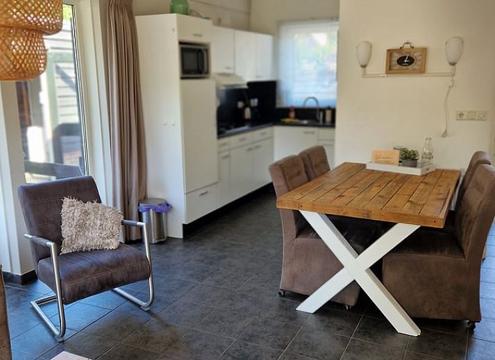 Cozy table set on terrace of vacation home in Putten, Veluwe, Gelderland.