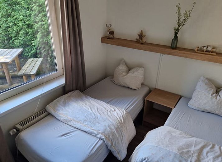 Open terrace of vacation home in Putten, Veluwe, Gelderland overlooking green nature.