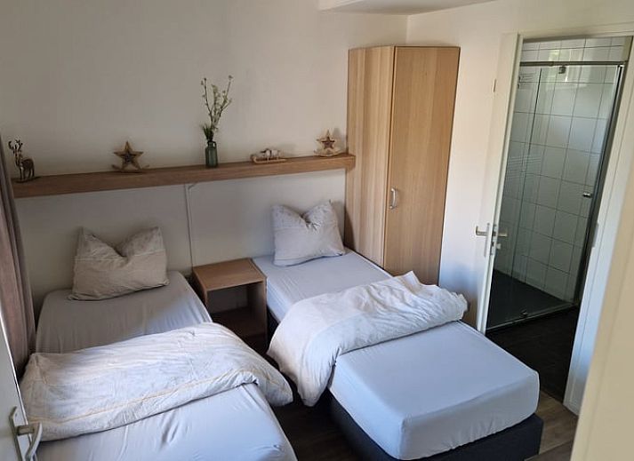 Open terrace of vacation home in Putten, Veluwe, Gelderland overlooking green nature.