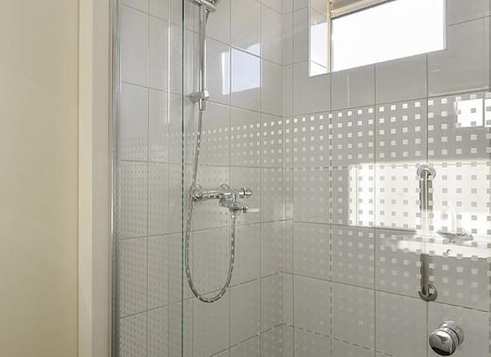 Open terrace of vacation home in Putten, Veluwe, Gelderland overlooking green nature.