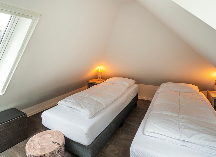 Veranda of Holiday home Sprielderbosch 24 'Rijckholt' in the Veluwe with comfortable seating.