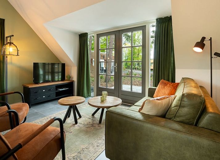 Charmantes Ferienhaus in Putten mit Reetdach, umgeben von der Veluwe-Natur, ideal fuer einen erholsamen Aufenthalt in Gelderland.