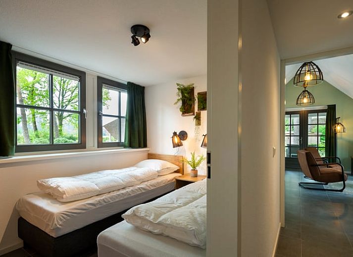 Charmantes Ferienhaus Cottage in Putten in der Veluwe, Gelderland. Geniessen Sie die rustikale Umgebung und das Reetdach inmitten der Natur.