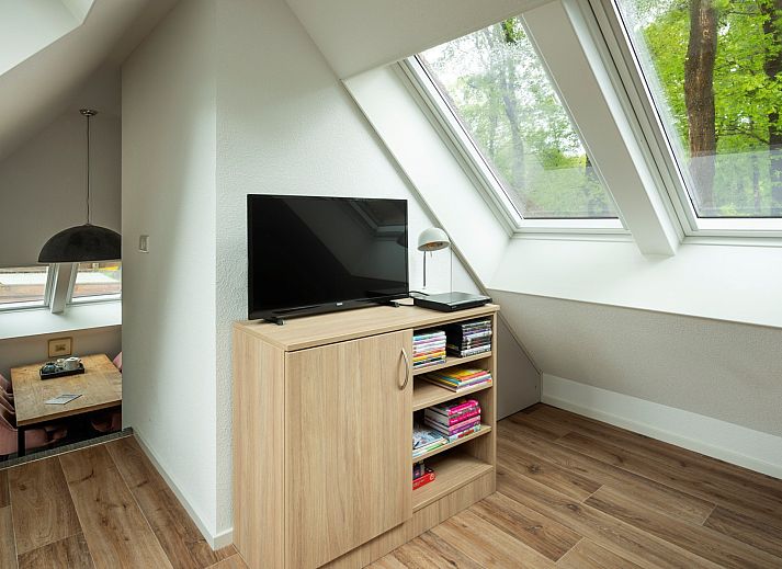 Komfortable Sitzecke im Ferienhaus Sprielderbosch 27 De Uitlaat in Putten, Veluwe, ideal zum Entspannen.