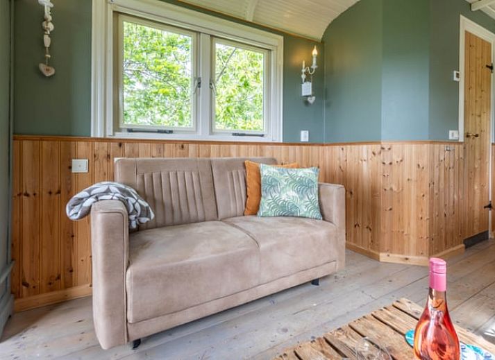 Outdoor area with picnic table at Holiday home in Wezep/Oldebroek, surrounded by nature on the Veluwe.