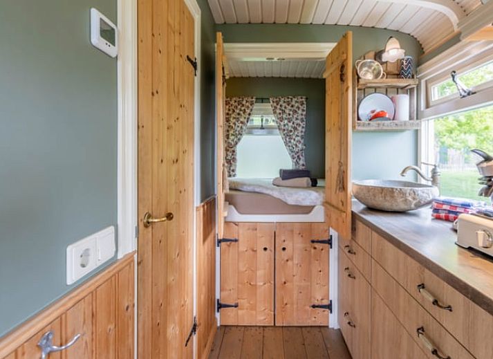 Cozy living room in Holiday Home in Wezep/Oldebroek, overlooking the Veluwe nature.
